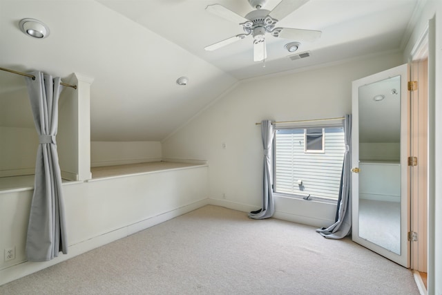 bonus room featuring vaulted ceiling, ceiling fan, and light colored carpet