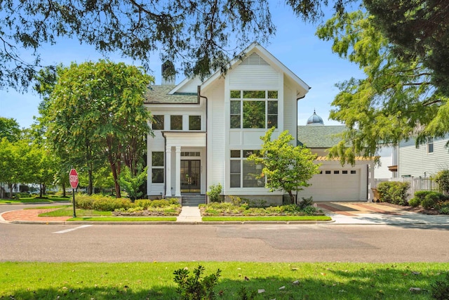 view of front of home with a garage