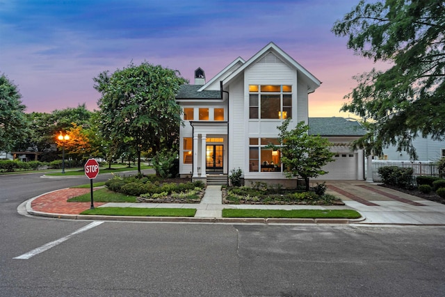 view of front of home with a garage