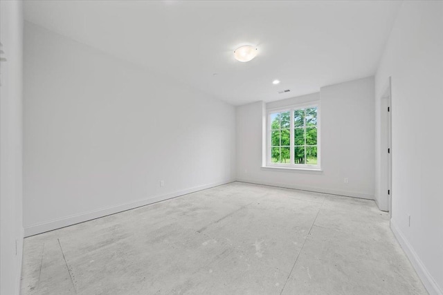9170 Old Green Ln, Germantown, TN 38138 - spare room featuring baseboards and concrete floors