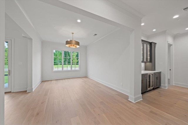 9170 Old Green Ln, Germantown, TN 38138 - spare room featuring light wood finished floors, recessed lighting, and beverage cooler