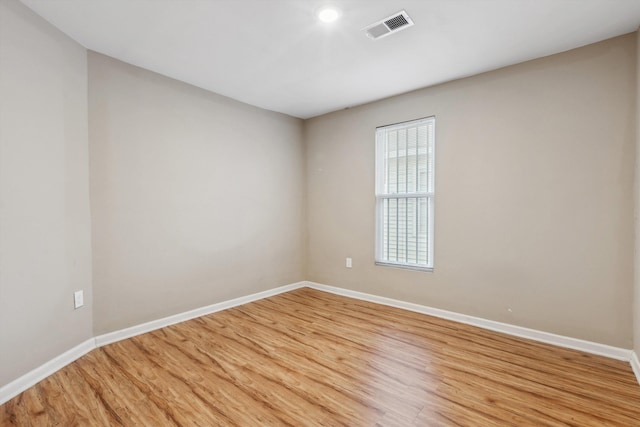 empty room featuring light hardwood / wood-style floors