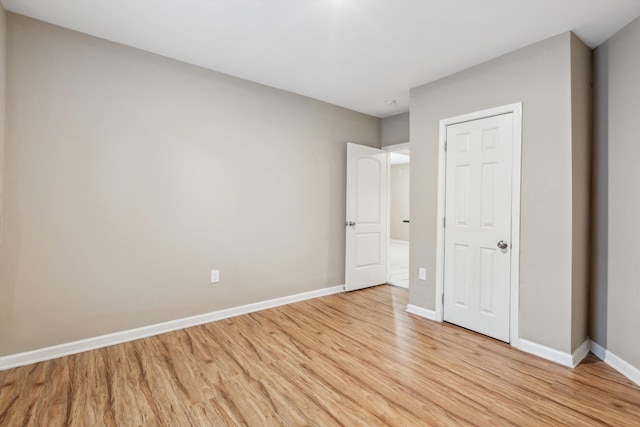 unfurnished bedroom featuring light hardwood / wood-style floors