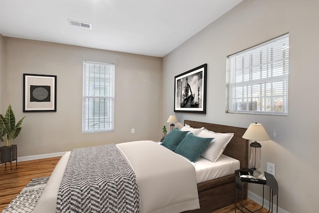 bedroom featuring wood-type flooring