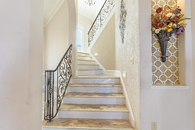 stairs with crown molding