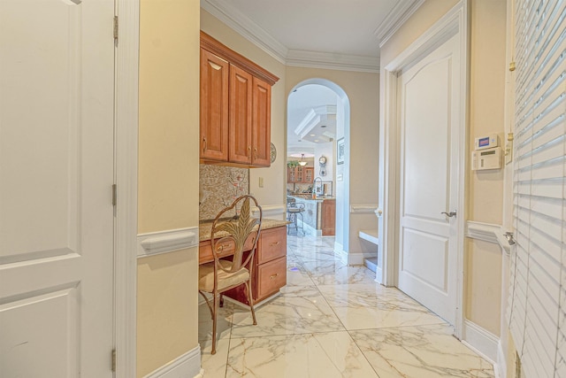 hallway featuring ornamental molding