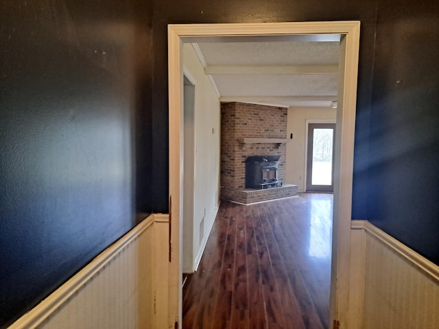 hall with dark hardwood / wood-style flooring