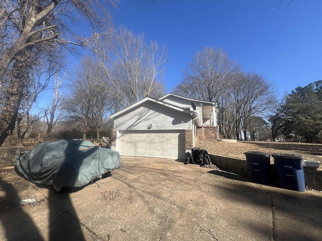 view of home's exterior featuring a garage