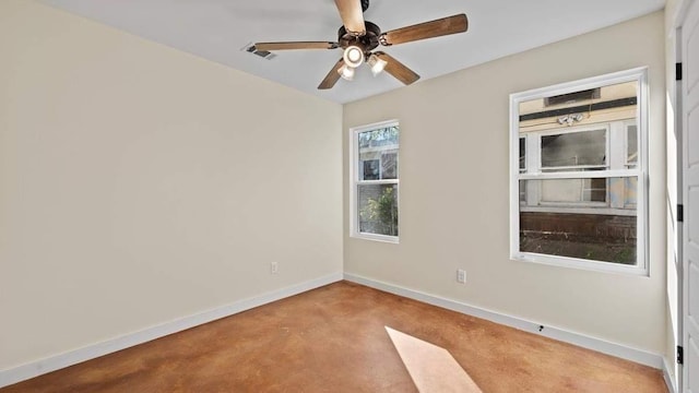 unfurnished room with ceiling fan