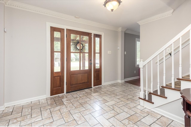 entryway featuring ornamental molding