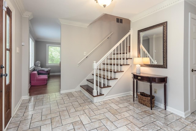 staircase with crown molding