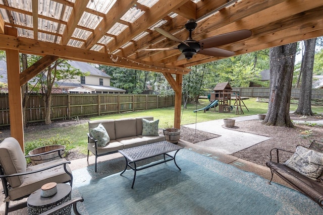 view of patio featuring a playground, an outdoor hangout area, and ceiling fan