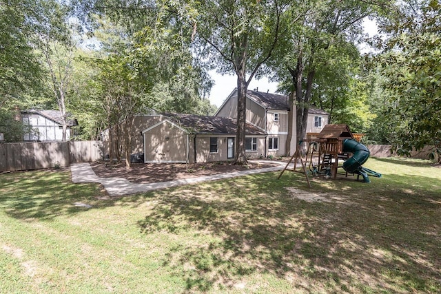 view of yard with a playground