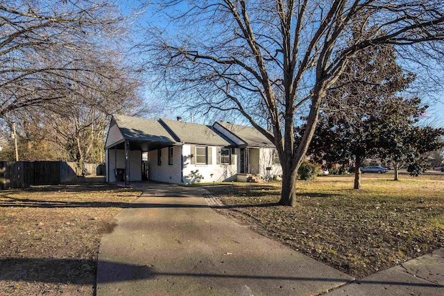 view of front facade with a carport