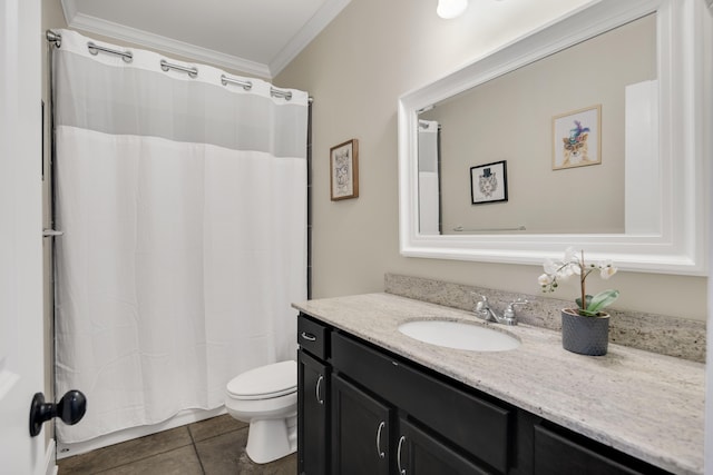 bathroom with tile patterned flooring, ornamental molding, vanity, and toilet