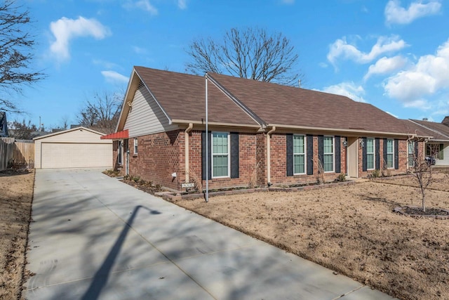 view of front of house featuring an outbuilding and a garage