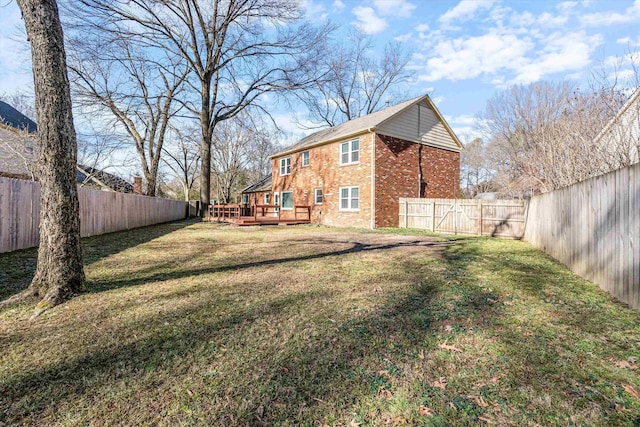 view of yard with a deck