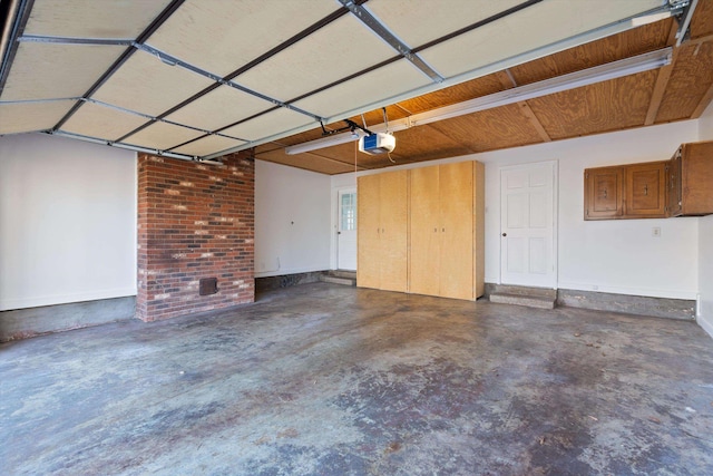 garage featuring a garage door opener