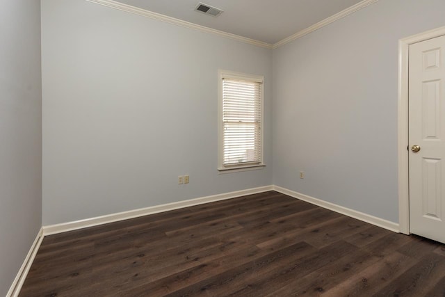 unfurnished room with ornamental molding and dark hardwood / wood-style flooring