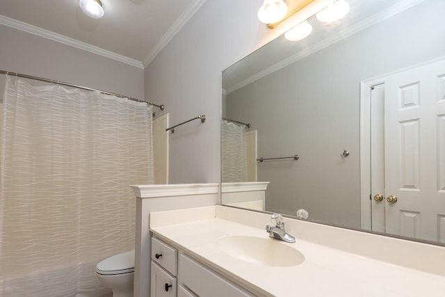 bathroom with vanity, ornamental molding, toilet, and walk in shower