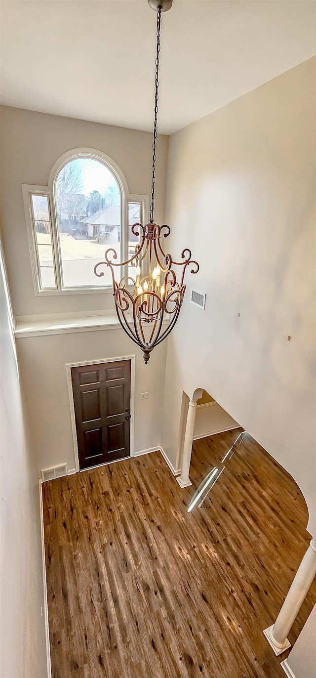 foyer entrance with hardwood / wood-style floors