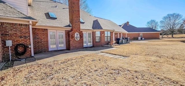 back of house with french doors