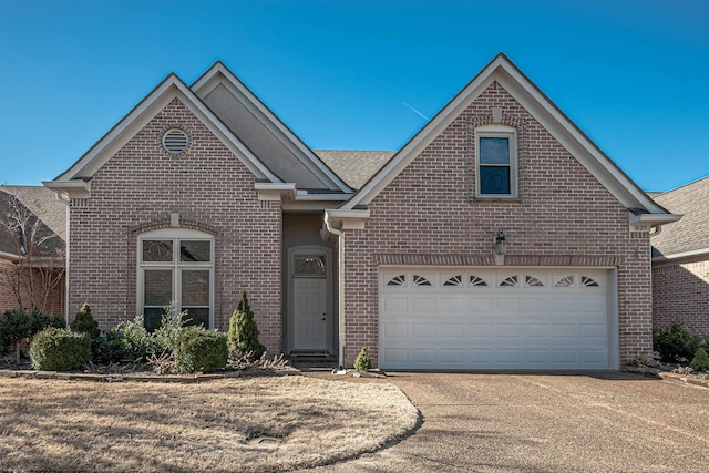 front of property with a garage