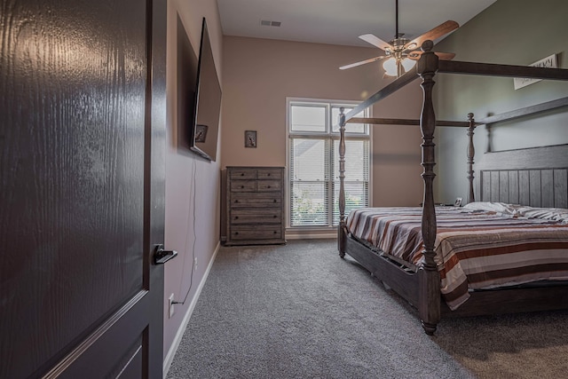 bedroom featuring vaulted ceiling, carpet flooring, and ceiling fan