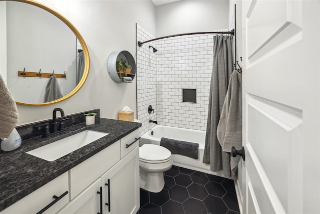 full bathroom featuring shower / tub combo with curtain, vanity, toilet, and tile patterned flooring