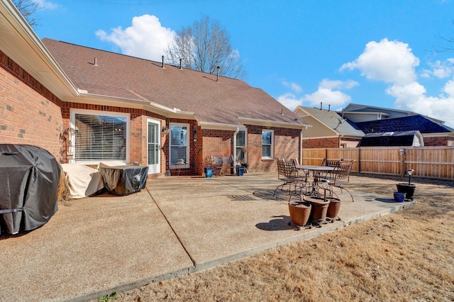 rear view of property with a patio