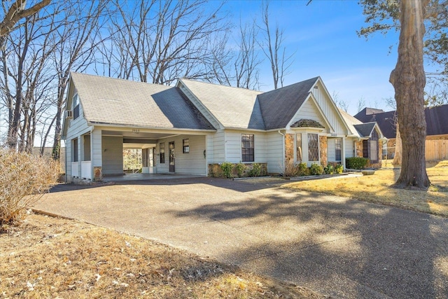 view of front of home with a carport