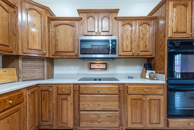 kitchen featuring black appliances