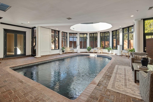 view of pool featuring french doors and a jacuzzi