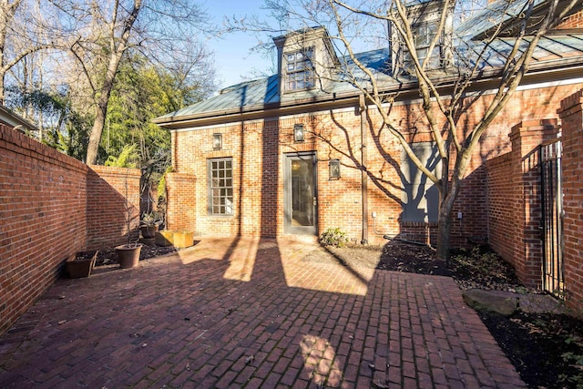 rear view of house featuring a patio area