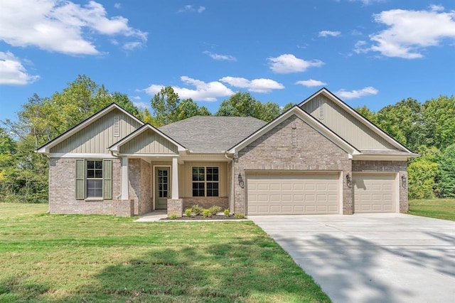 view of front of house with a garage and a front yard