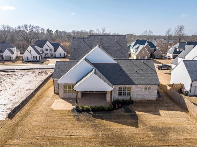 drone / aerial view featuring a residential view