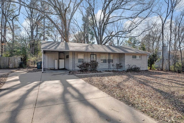 ranch-style house with a carport