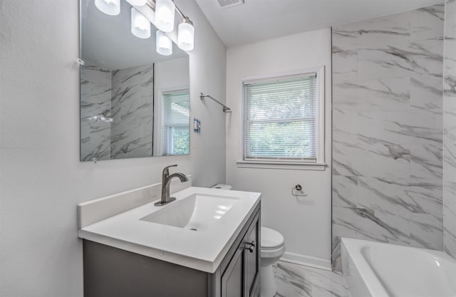 full bathroom with vanity, shower / tub combination, and toilet