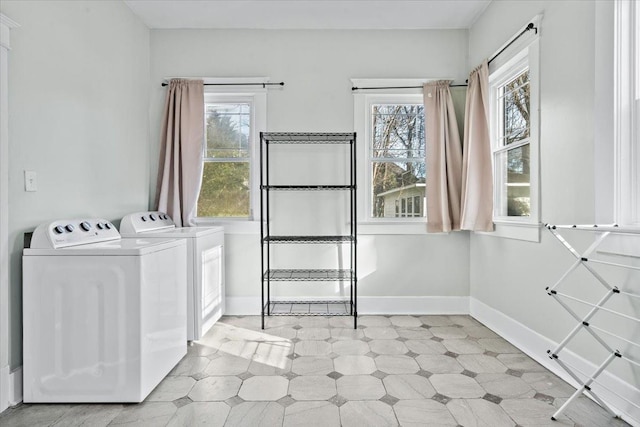 laundry area featuring independent washer and dryer