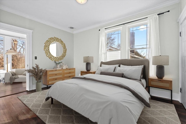 bedroom featuring ornamental molding and dark hardwood / wood-style floors