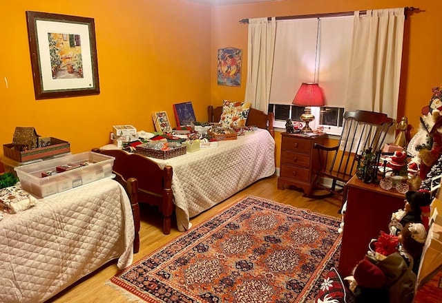 bedroom with light wood-type flooring