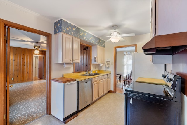 kitchen featuring light floors, electric range, wood walls, a sink, and dishwasher