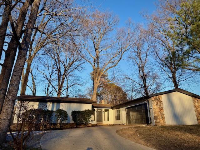 single story home featuring a garage