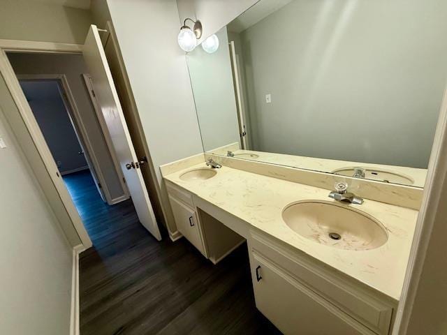 bathroom featuring vanity and hardwood / wood-style flooring