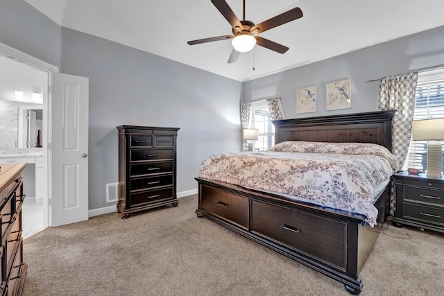 bedroom featuring ceiling fan and light carpet