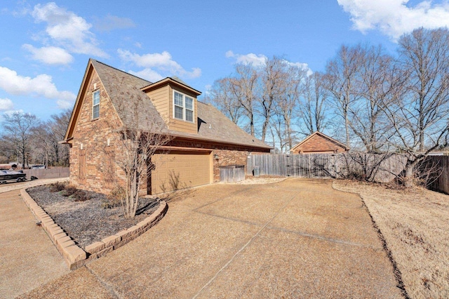 view of property exterior with a garage