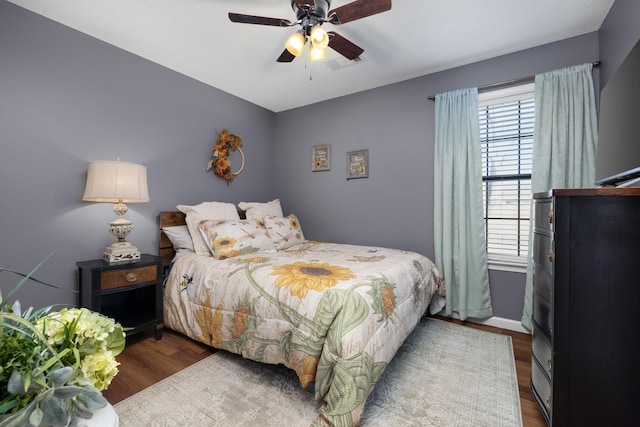 bedroom featuring ceiling fan and hardwood / wood-style floors