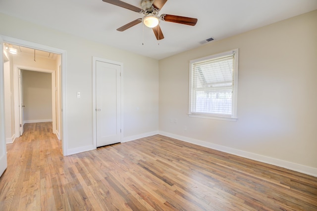 unfurnished bedroom featuring light hardwood / wood-style floors and ceiling fan