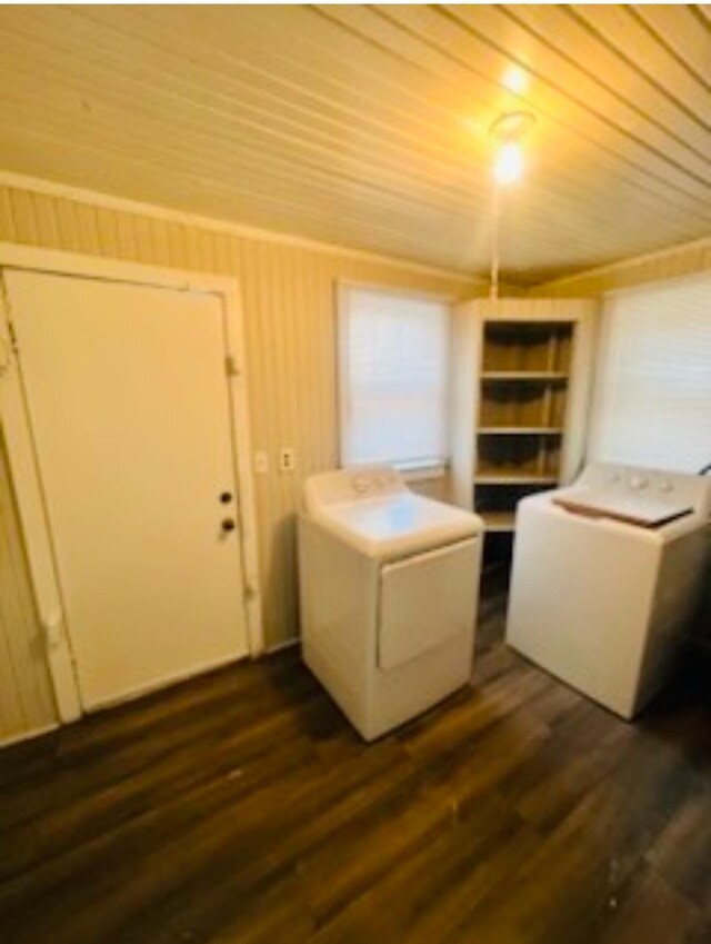 interior space featuring washer and dryer, wooden ceiling, and dark hardwood / wood-style flooring