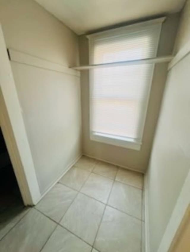 interior space featuring light tile patterned floors